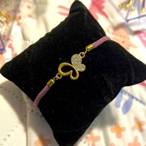 Ringstones butterfly bracelet purple & gold